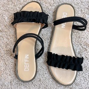 Black ruffle slide sandal